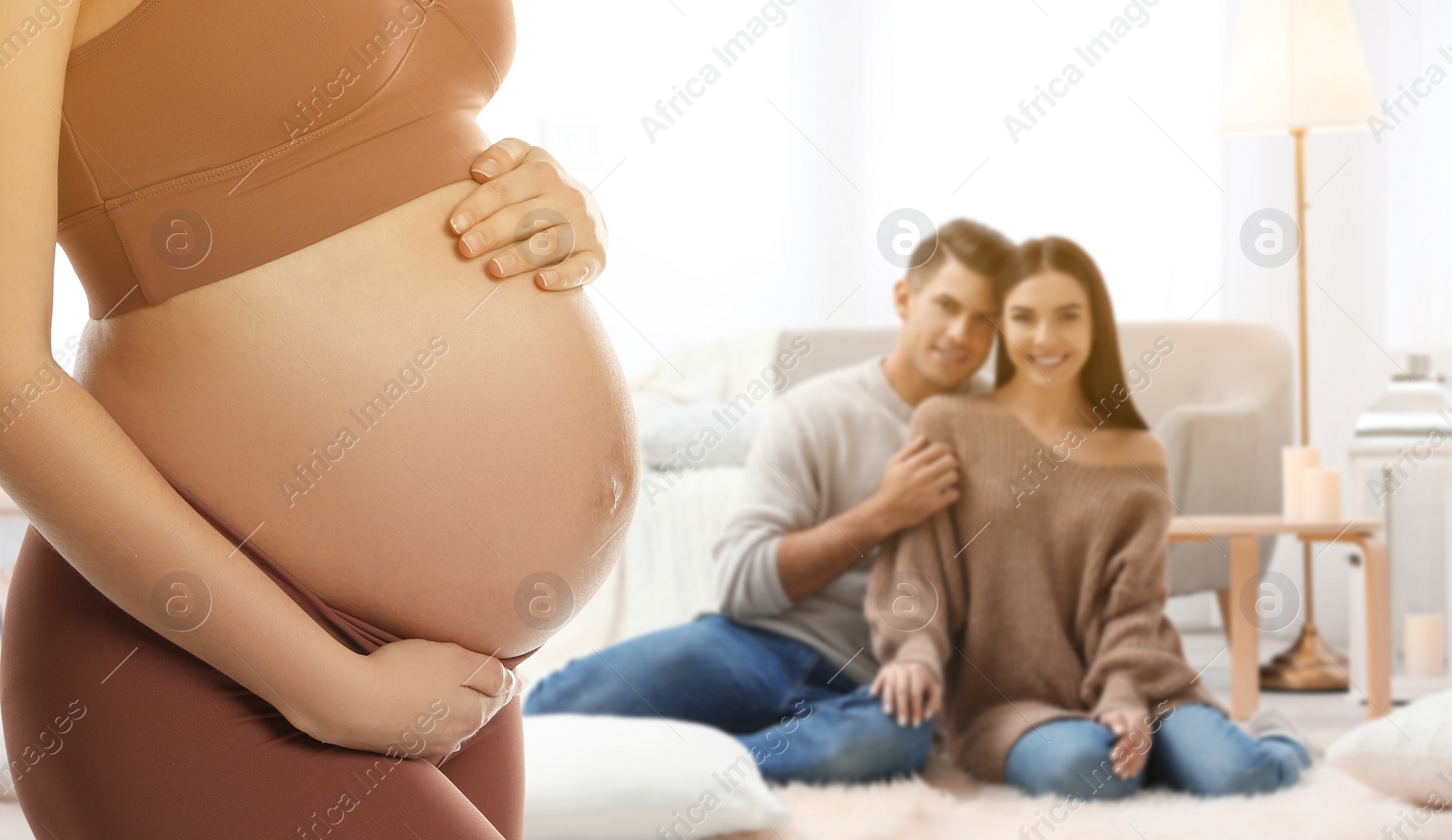 Image of Surrogate mother and intended parents indoors. Banner design