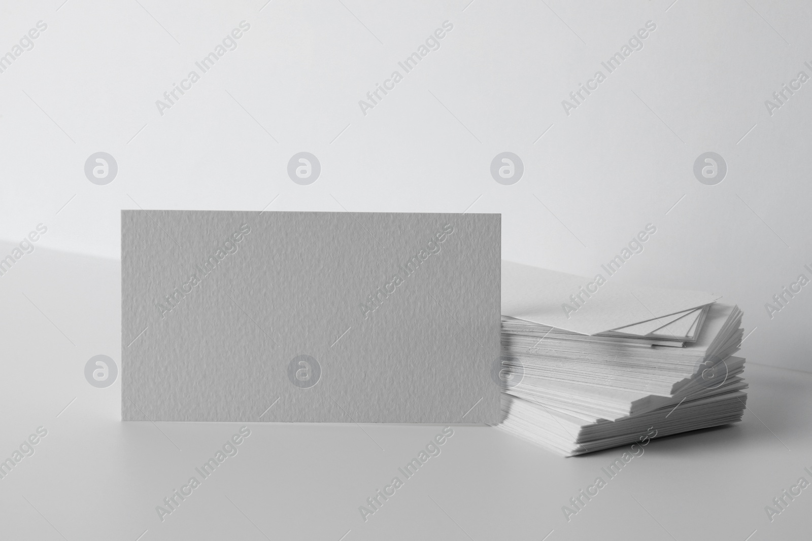 Photo of Blank business cards on white background. Mockup for design