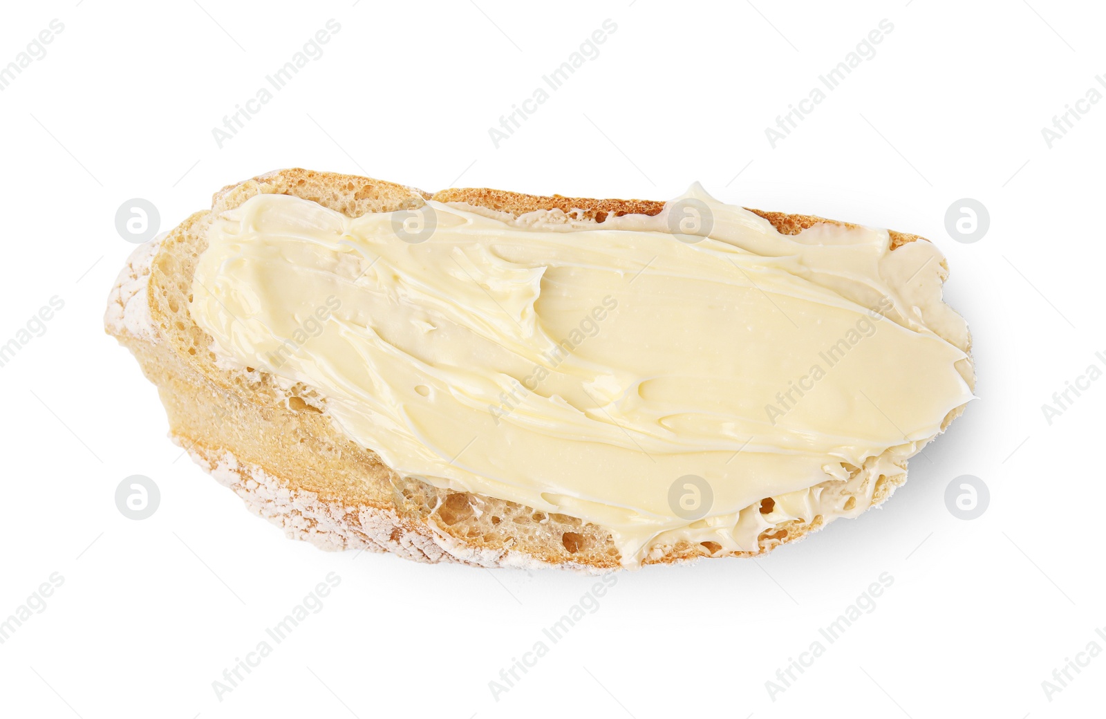 Photo of Slice of tasty bread with butter isolated on white, top view