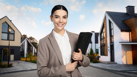 Image of Smiling real estate agent with portfolio outdoors. Beautiful houses on street
