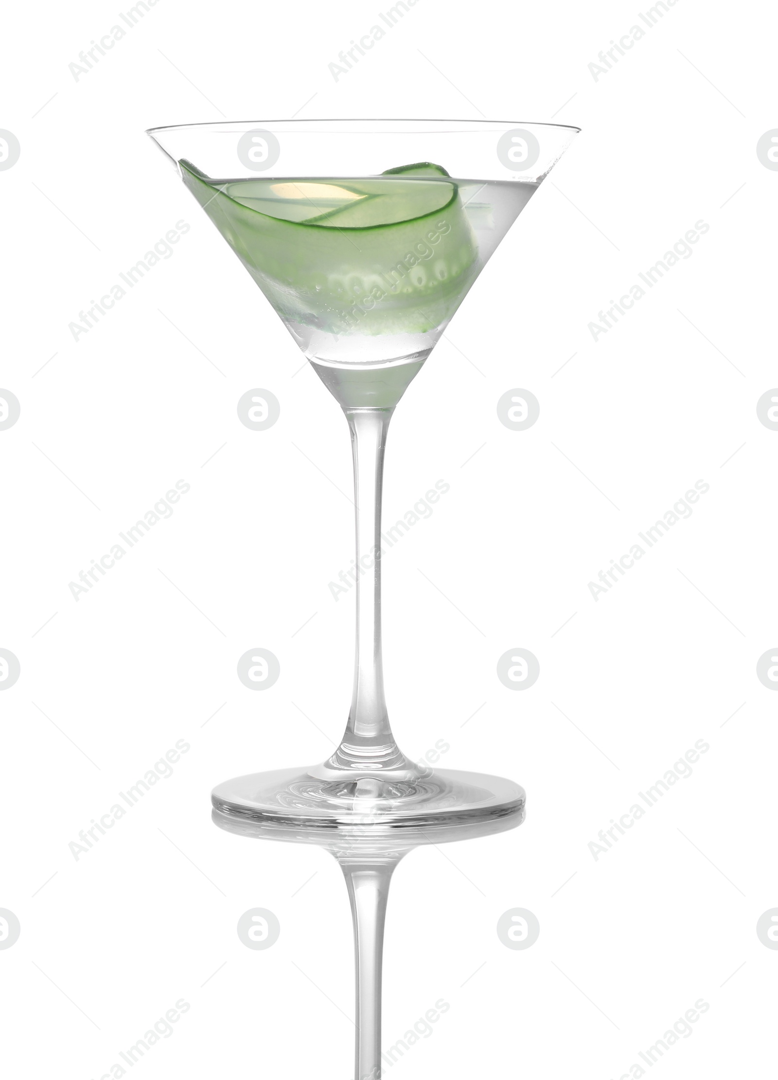 Photo of Glass of tasty martini with cucumber on white background