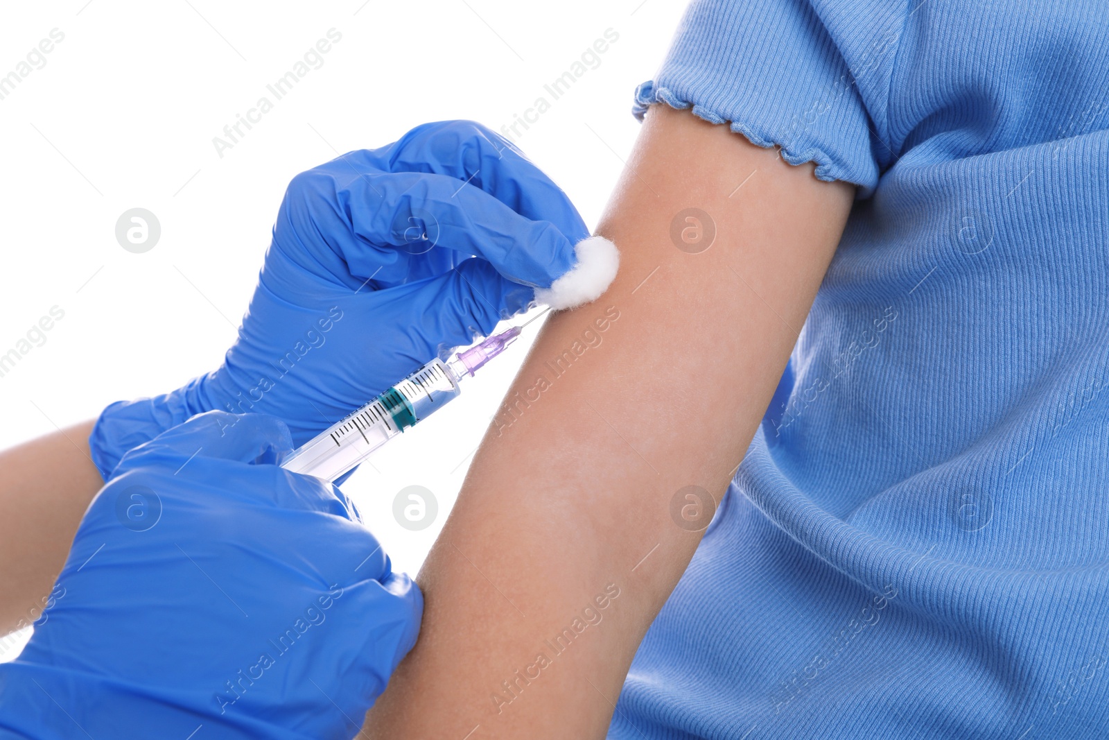 Photo of Little girl receiving chickenpox vaccination on white background, closeup. Varicella virus prevention