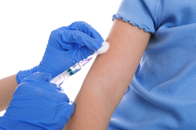 Little girl receiving chickenpox vaccination on white background, closeup. Varicella virus prevention