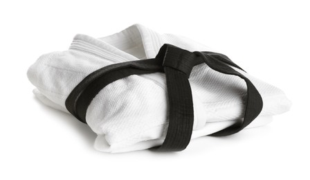 Photo of Martial arts uniform with black belt on white background