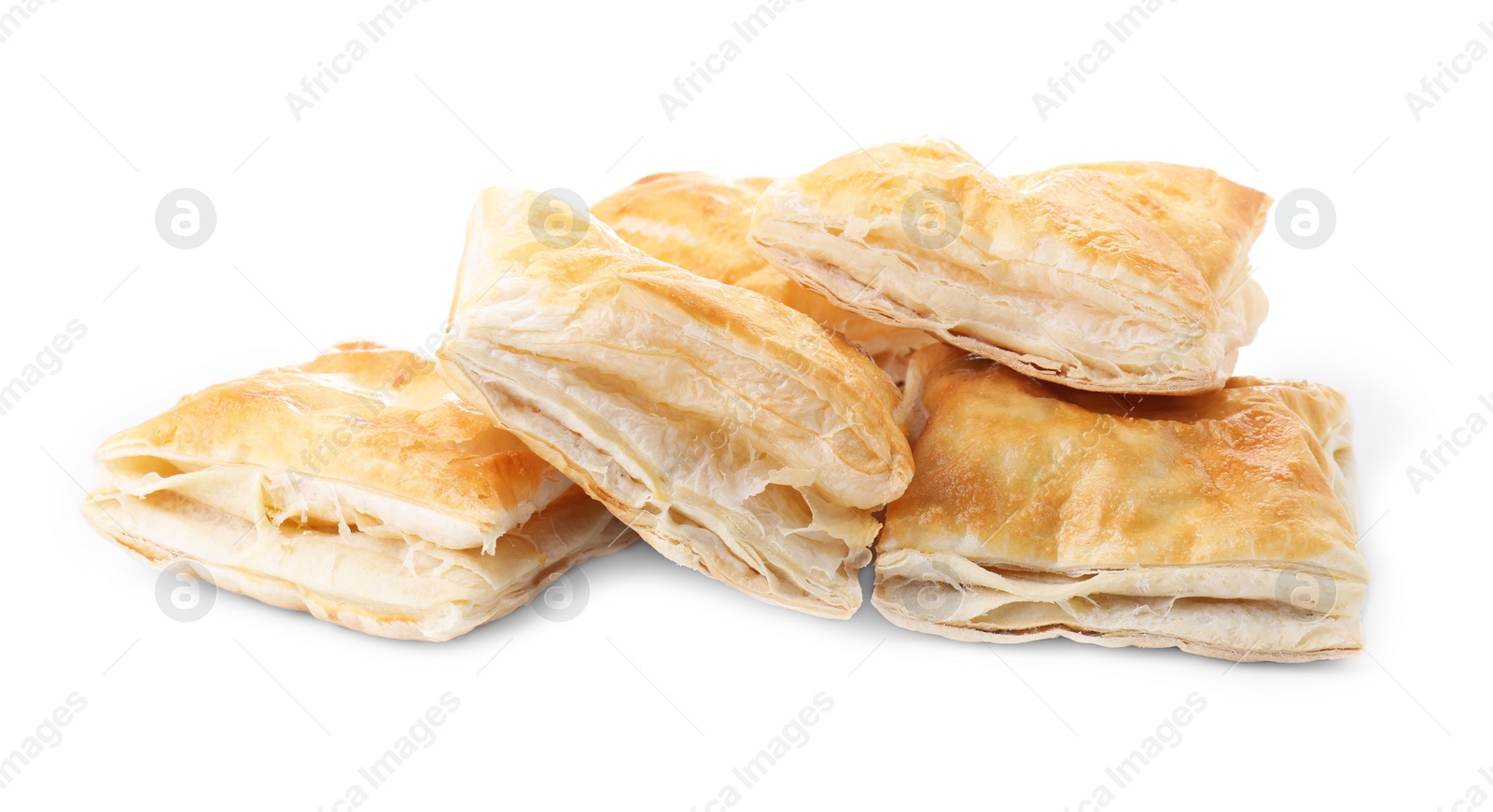 Photo of Delicious fresh puff pastries isolated on white