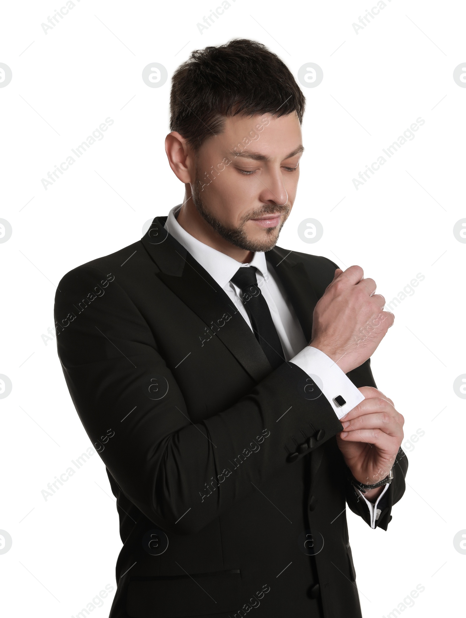 Photo of Man wearing stylish suit and cufflinks on white background