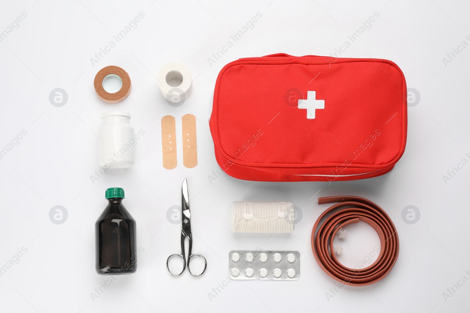 Photo of Flat lay composition with first aid kit on white background