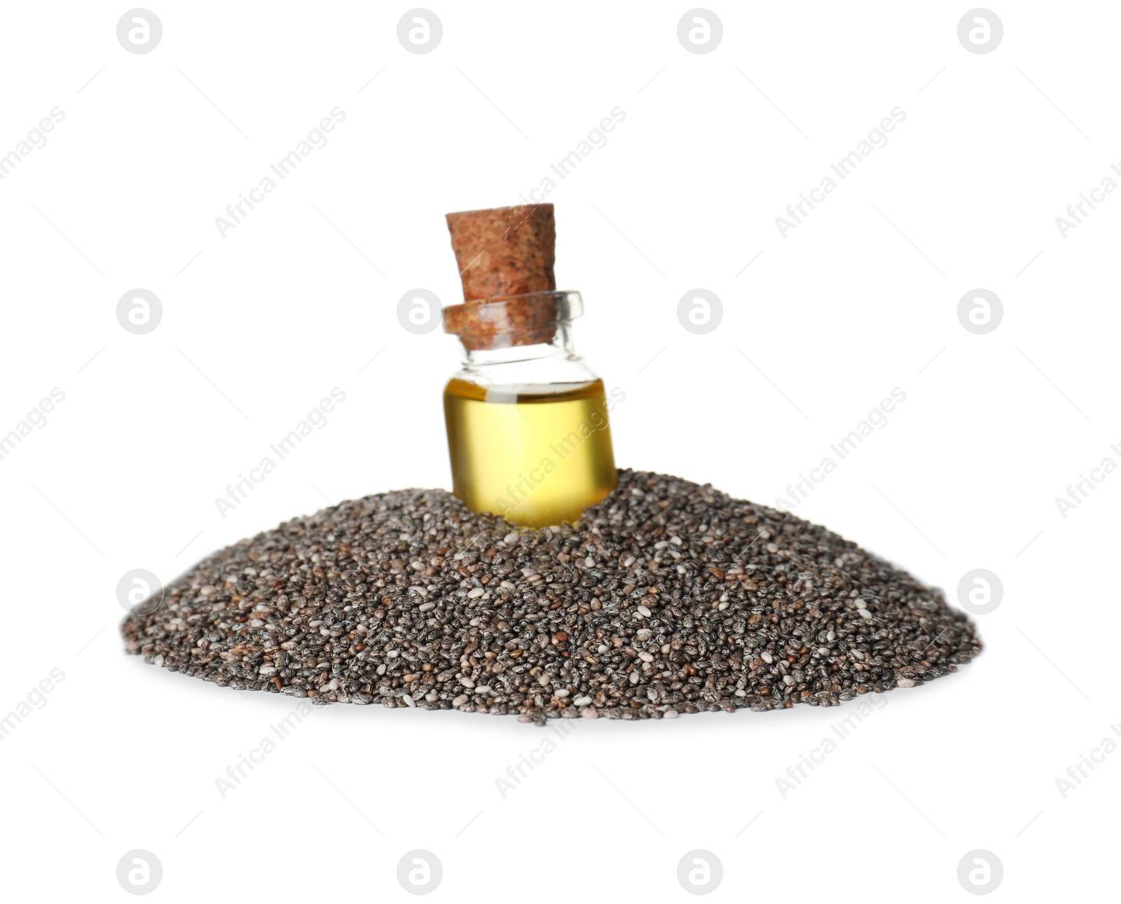 Photo of Bottle of chia oil in seeds on white background