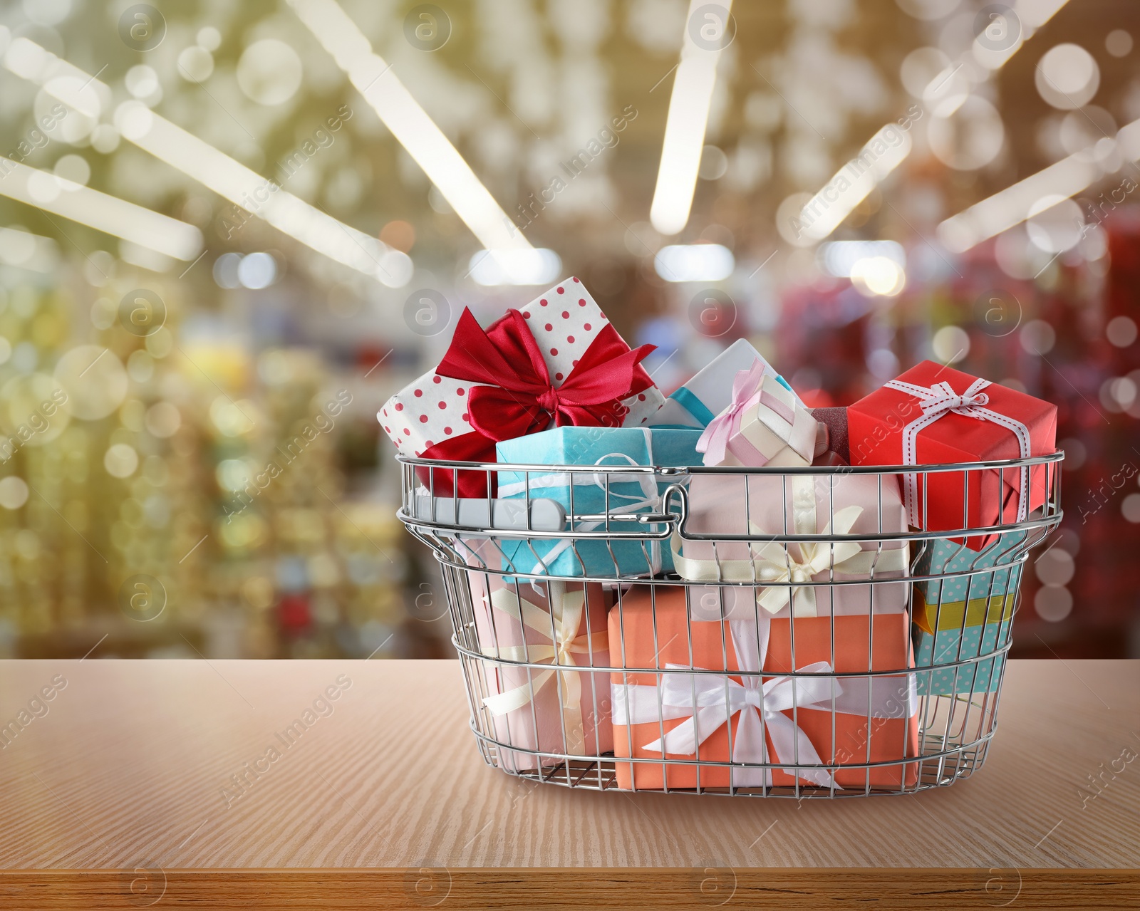 Image of Boxing day concept. Shopping basket with gifts in supermarket