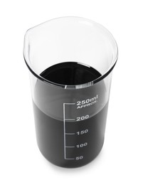Photo of Beaker with black crude oil isolated on white