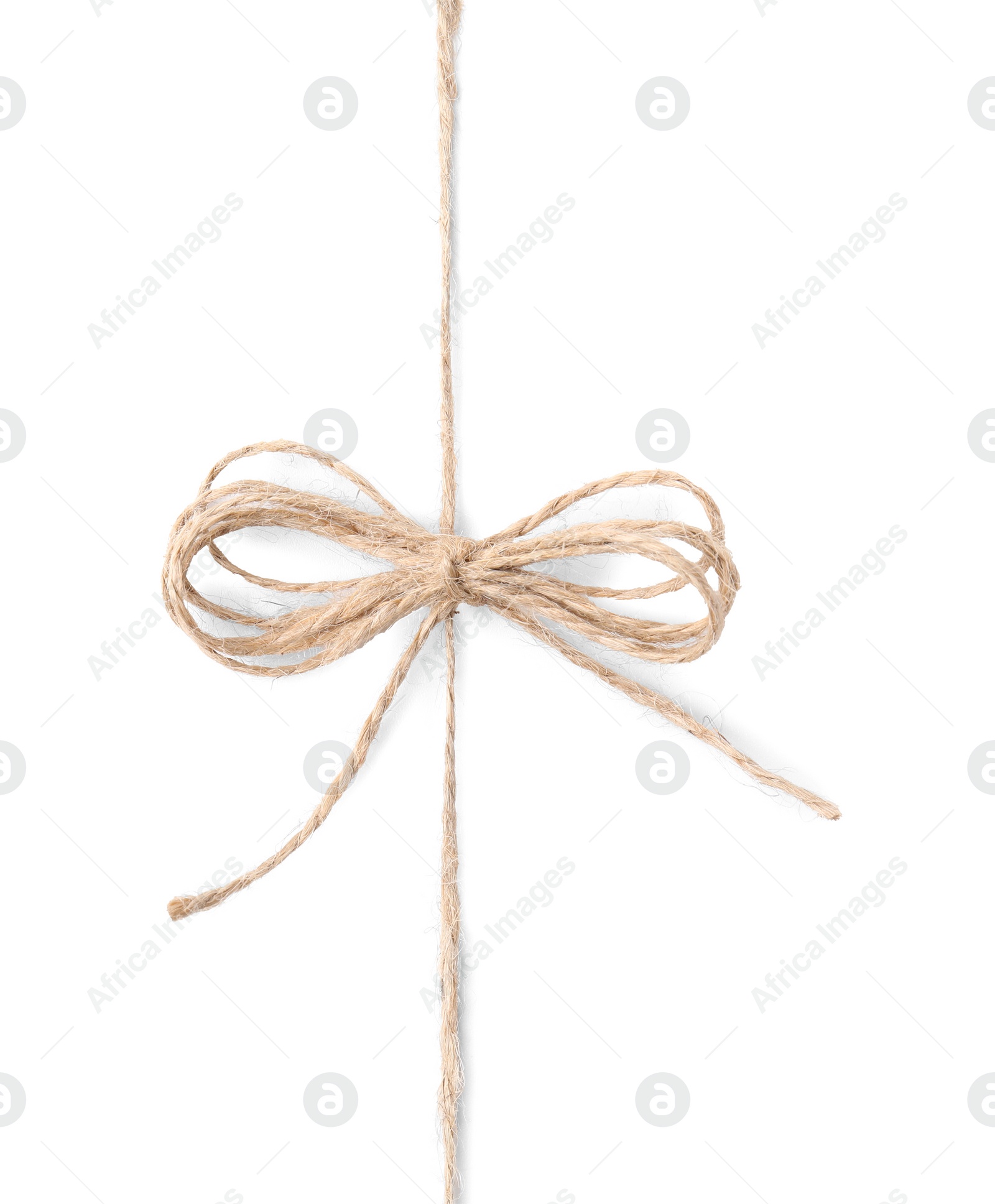 Photo of Linen rope string with bow isolated on white, top view