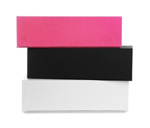 Stack of colorful shoe boxes on white background