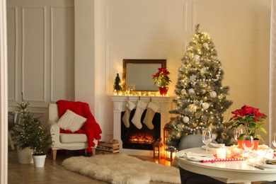 Fireplace in beautiful living room decorated for Christmas