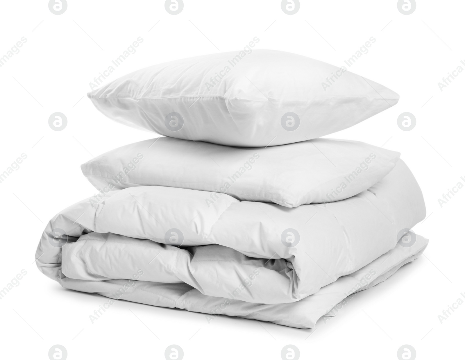 Photo of Clean blanket and pillows on white background