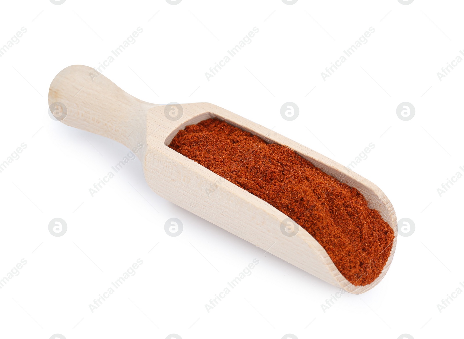 Photo of Scoop of aromatic paprika isolated on white