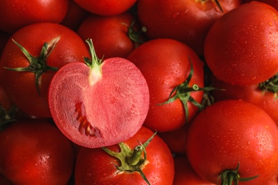 Photo of Fresh ripe red tomatoes as background, closeup