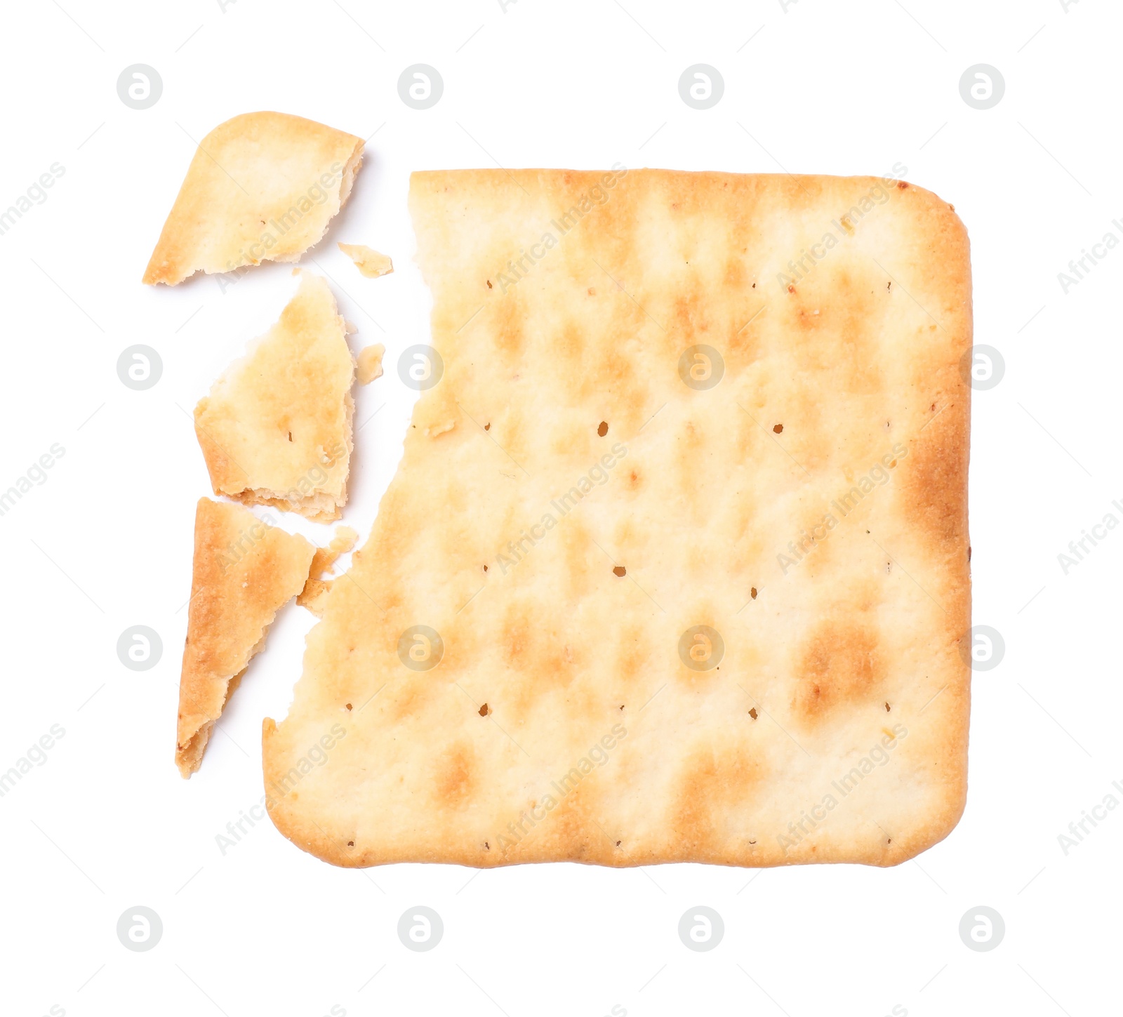 Photo of Crispy broken cracker isolated on white, top view