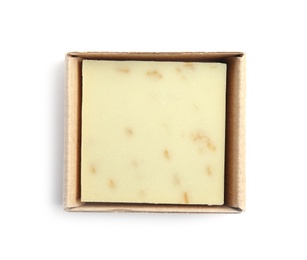 Photo of Hand made soap bar in cardboard package on white background, top view