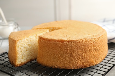 Delicious fresh homemade cake on grey table