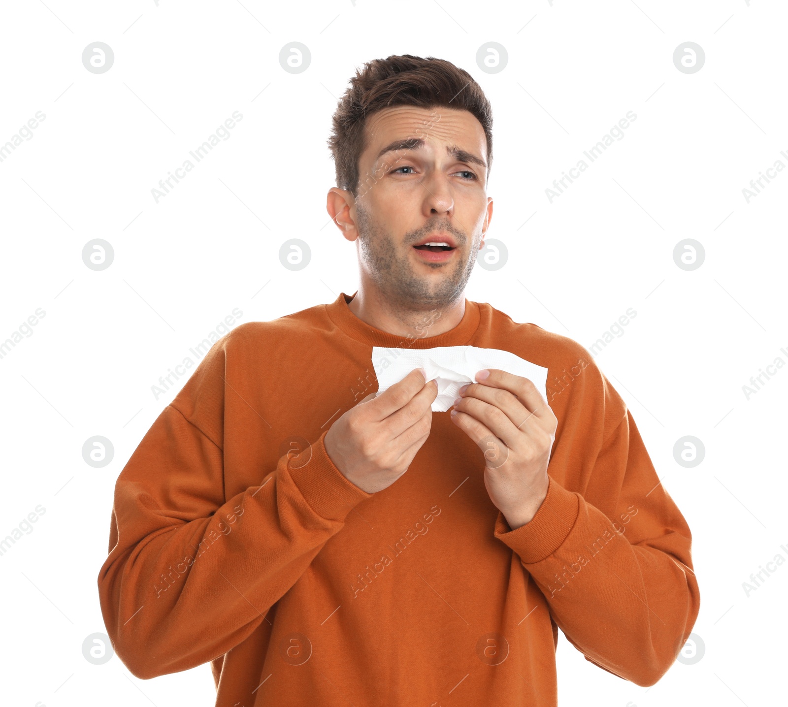 Photo of Young man suffering from cold on white background