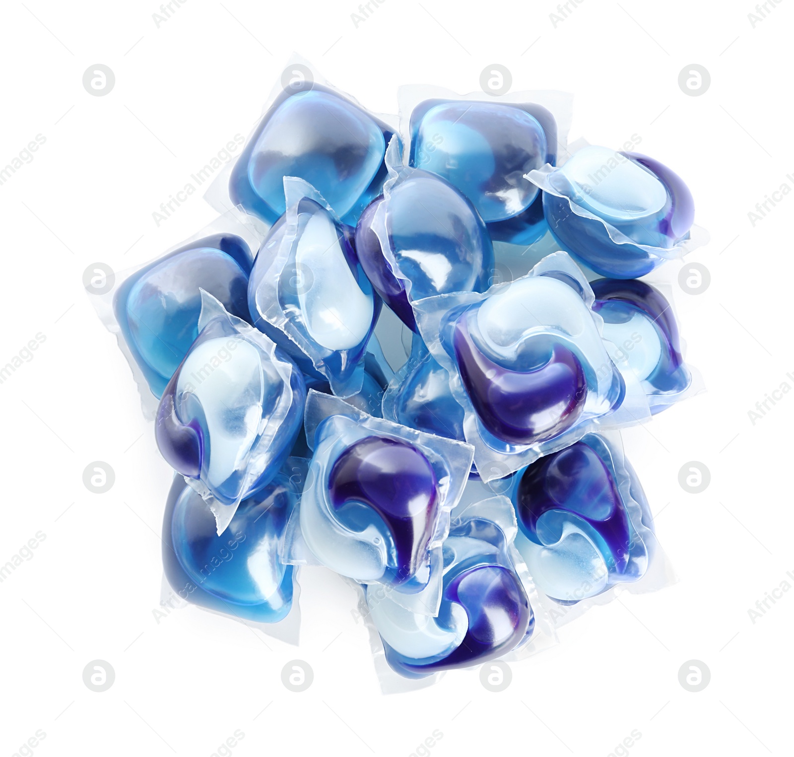 Photo of Heap of laundry capsules on white background, top view