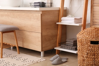 Modern bathroom interior with decorative ladder and countertop