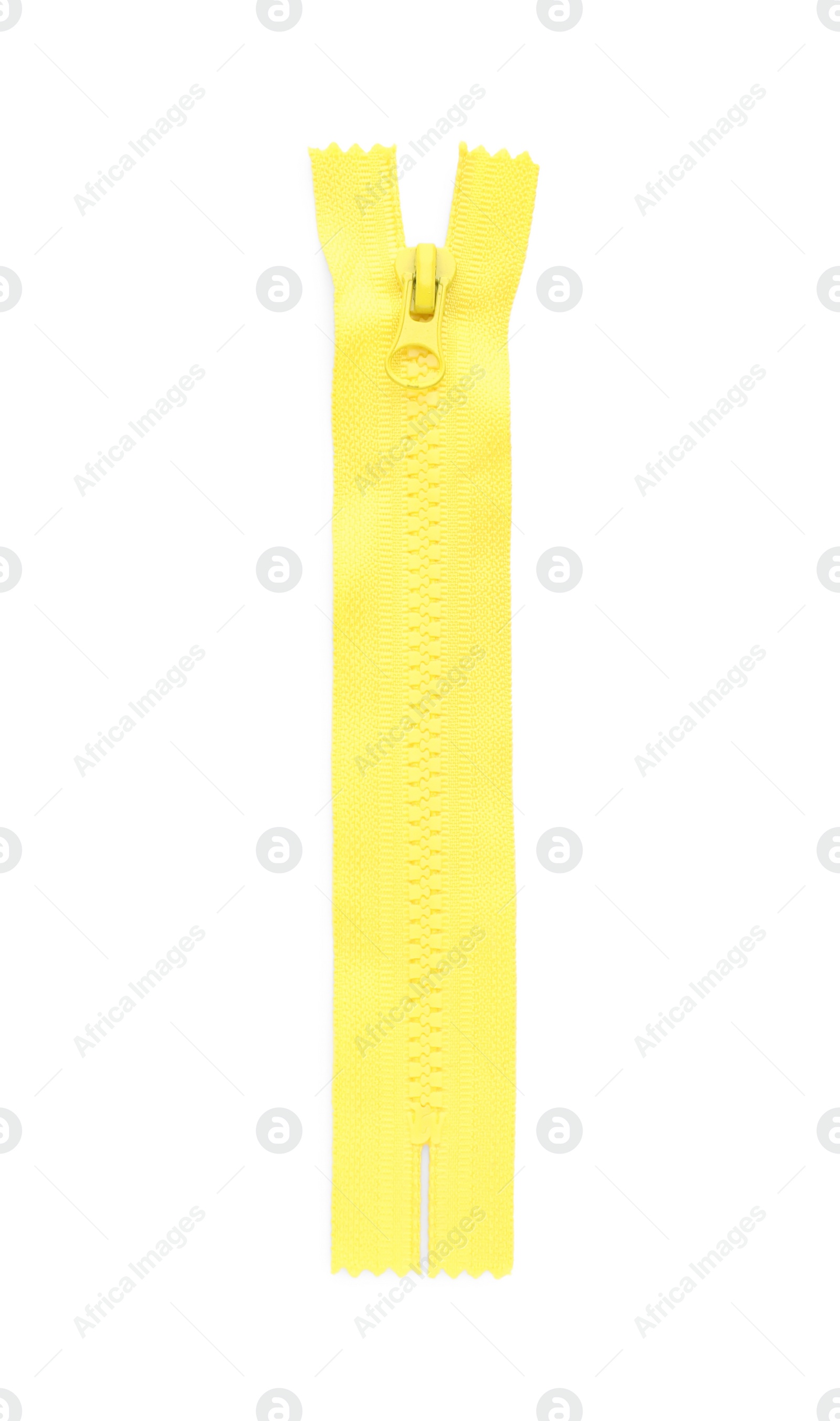 Photo of Yellow zipper isolated on white, top view