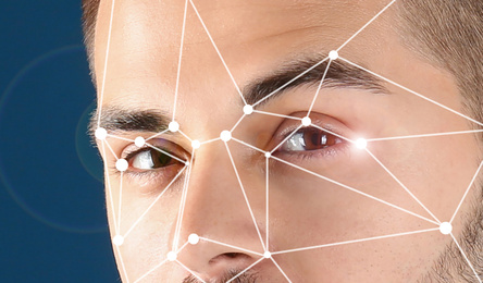Image of Facial recognition system. Young man with digital biometric grid, closeup