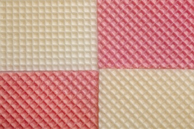 Photo of Tasty wafers as background, top view. Crispy food
