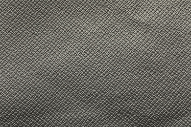 Photo of Texture of grey leather as background, closeup