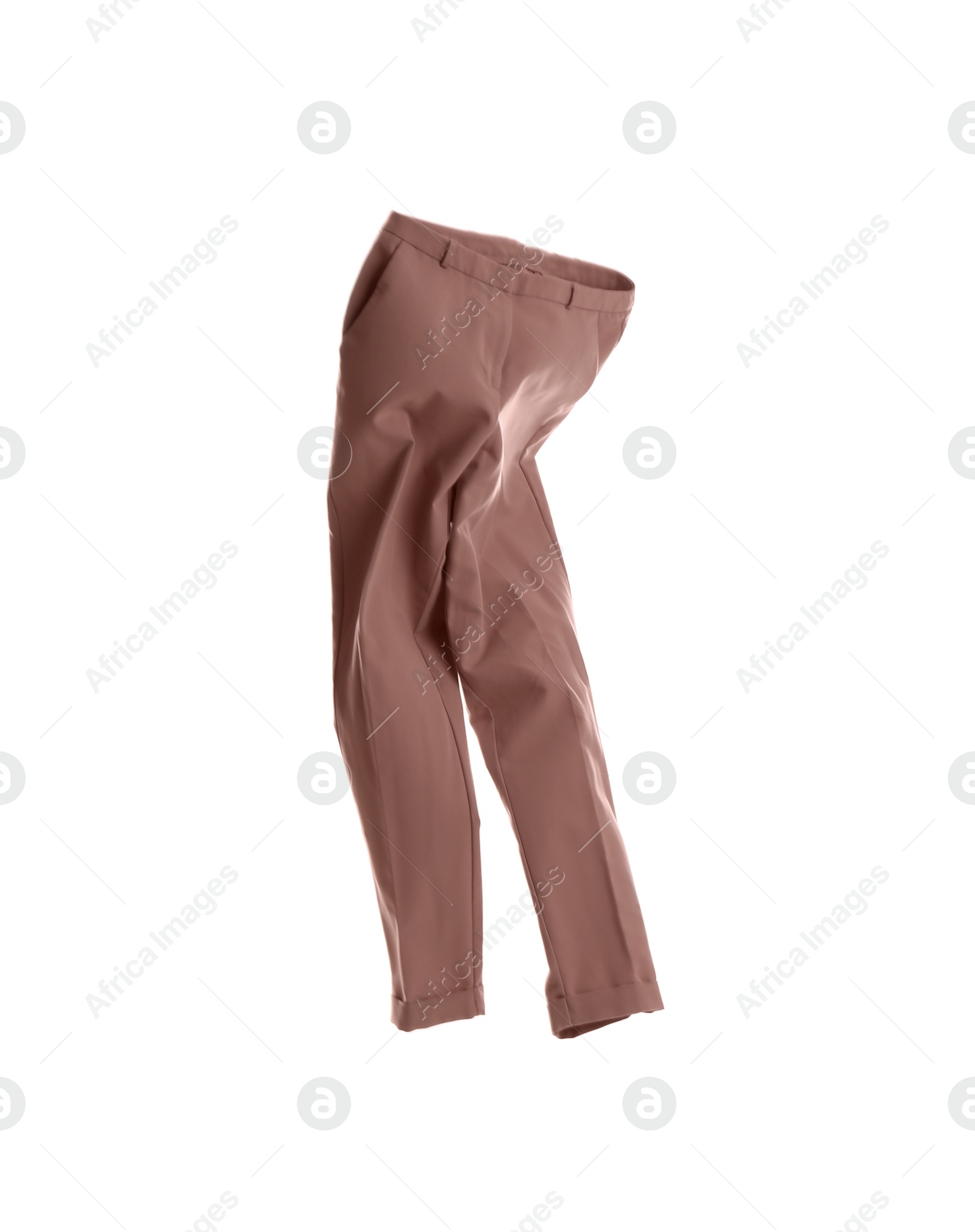 Photo of Beige pants isolated on white. Stylish clothes