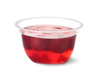 Tasty jelly dessert with strawberries in plastic cup on white background