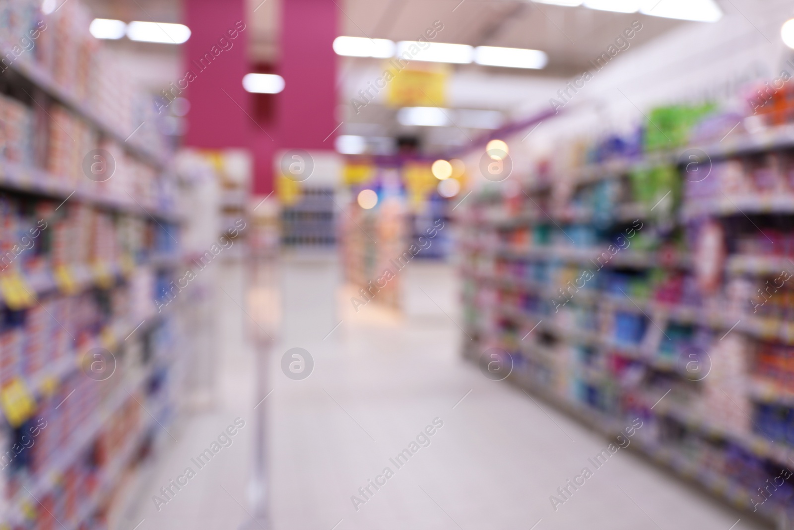 Photo of Blurred view of supermarket interior with bokeh effect