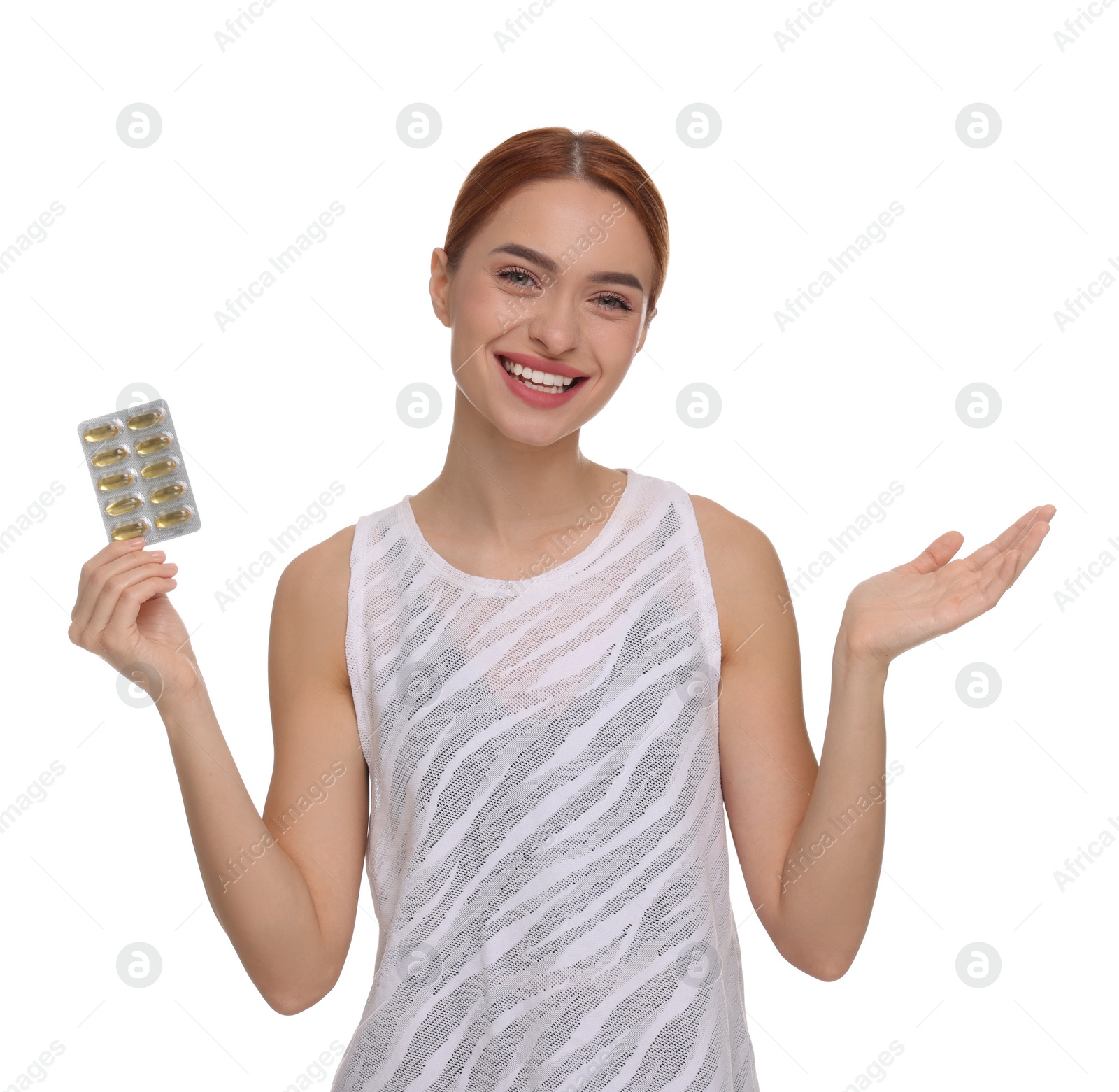 Photo of Happy young woman with pills on white background. Weight loss