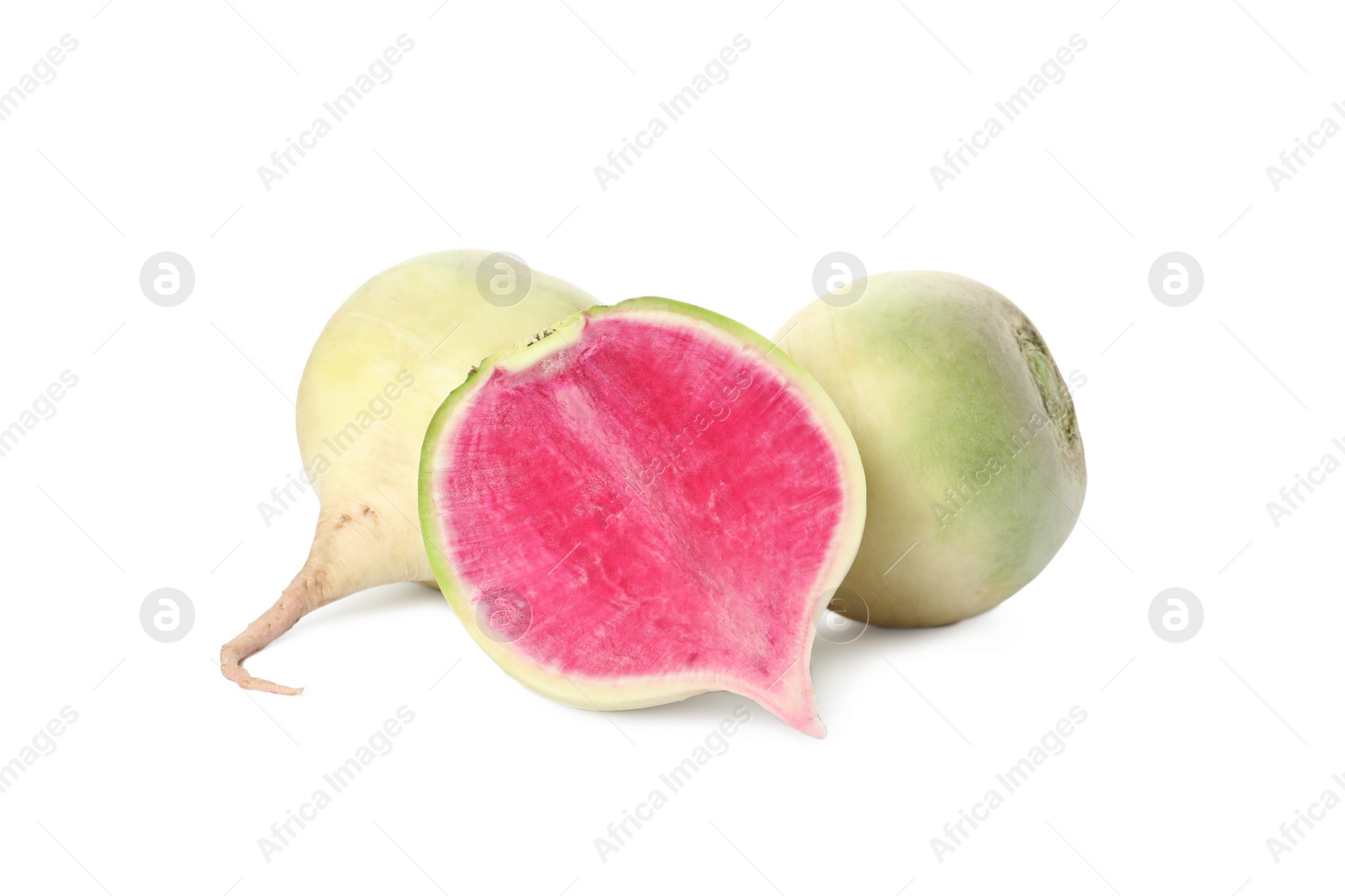 Photo of Cut and whole fresh ripe turnips on white background