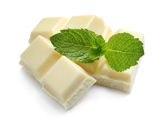 Pieces of white chocolate with mint on white background