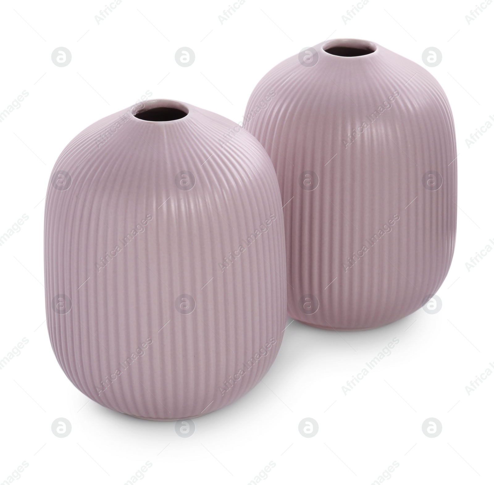 Photo of Stylish empty pink ceramic vases isolated on white