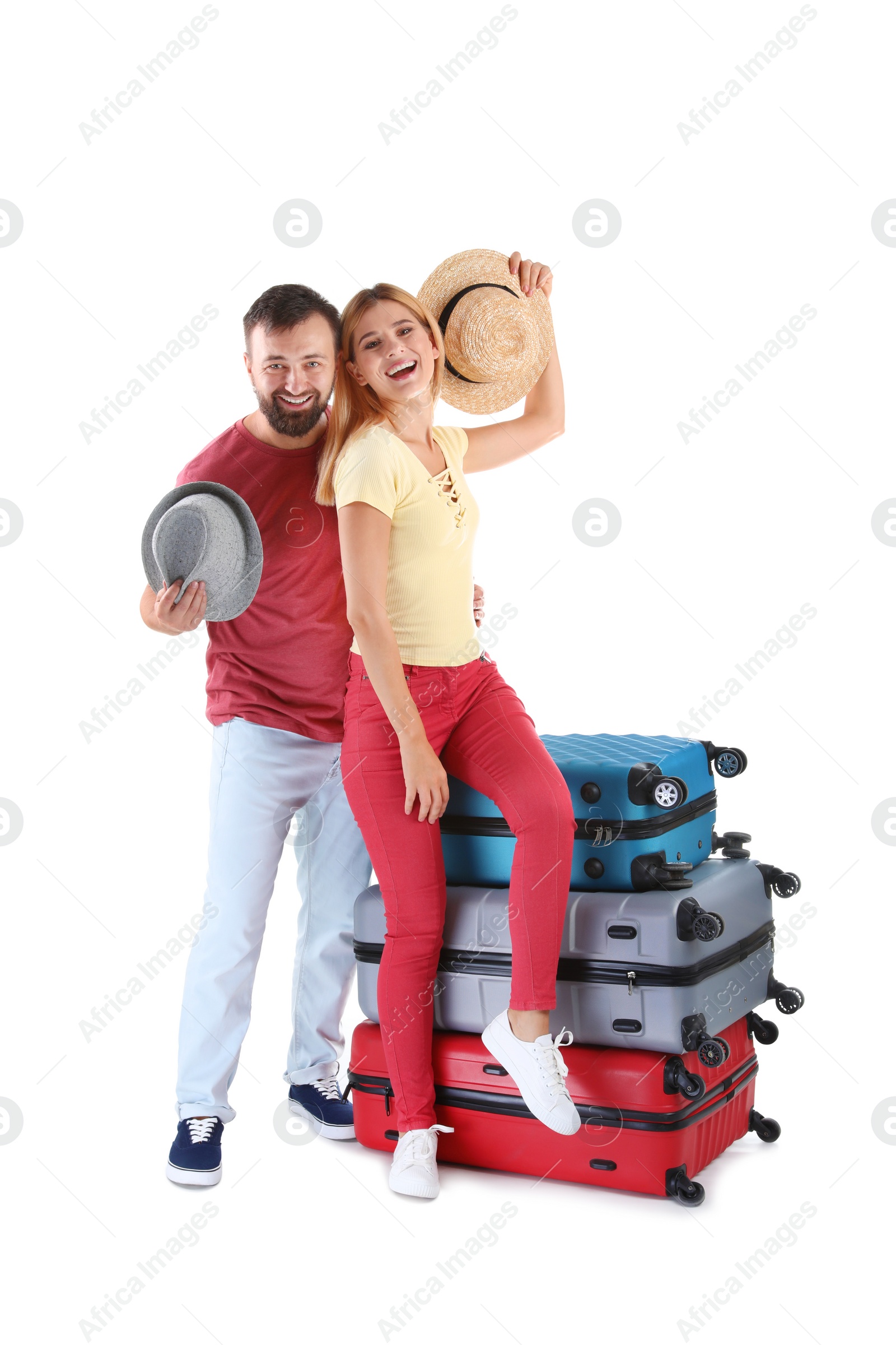 Photo of Couple with suitcases on white background. Vacation travel
