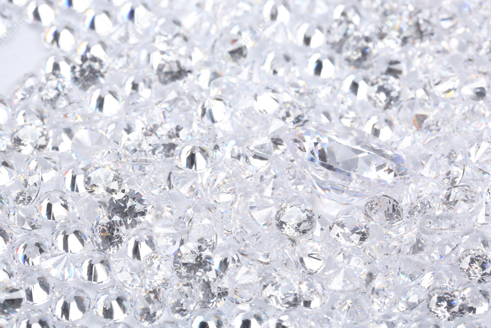 Photo of Many beautiful shiny diamonds as background, closeup