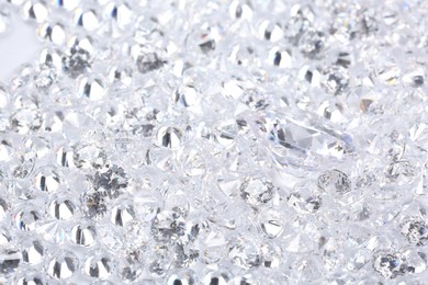 Many beautiful shiny diamonds as background, closeup