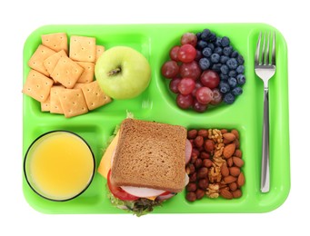 Green tray with tasty food and juice on white background, top view. School lunch