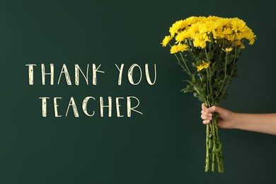 Image of Woman holding beautiful bouquet near green chalkboard with phrase Thank You Teacher, closeup