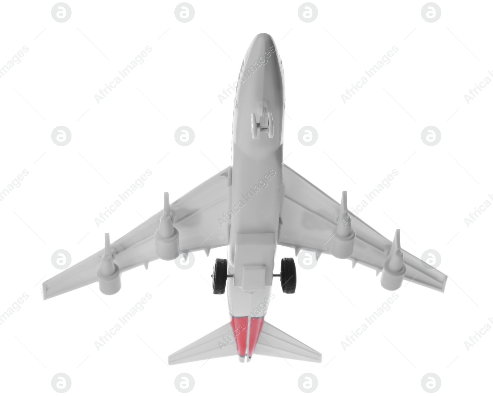 Photo of Toy airplane isolated on white. Travel concept