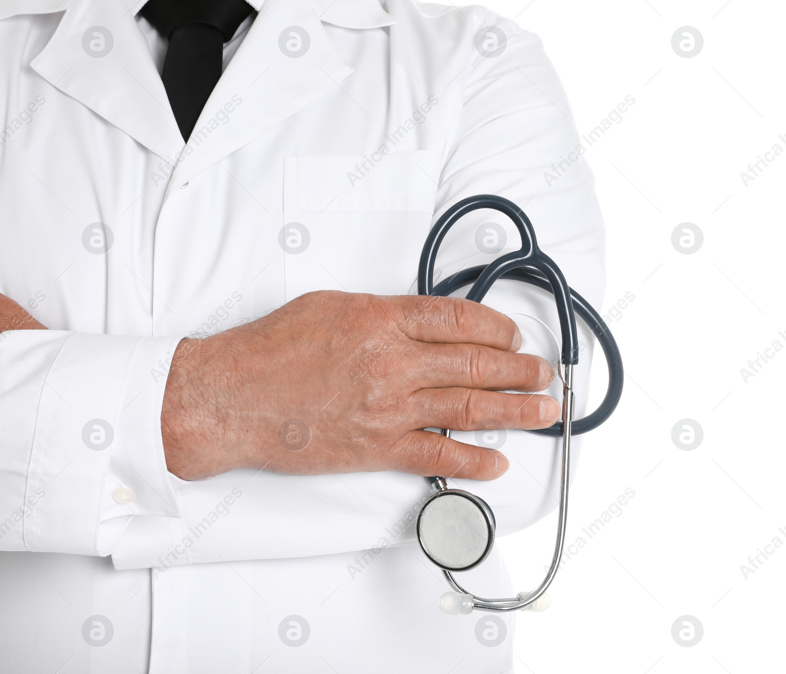 Photo of Male doctor with stethoscope isolated on white, closeup. Medical staff