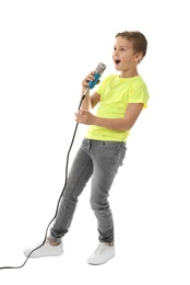 Cute boy singing in microphone on white background