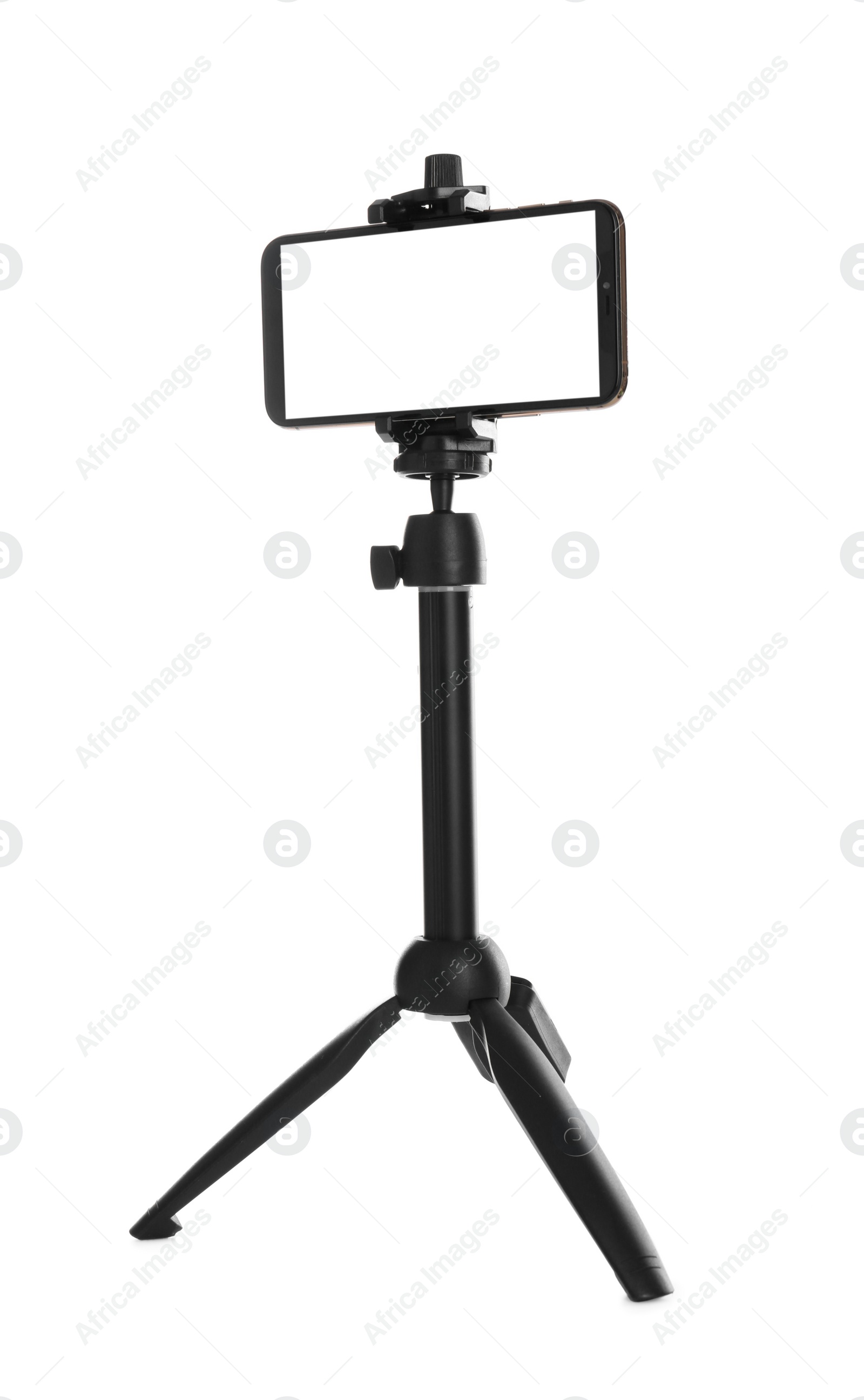 Photo of Smartphone with blank screen fixed to tripod on white background, mockup for design