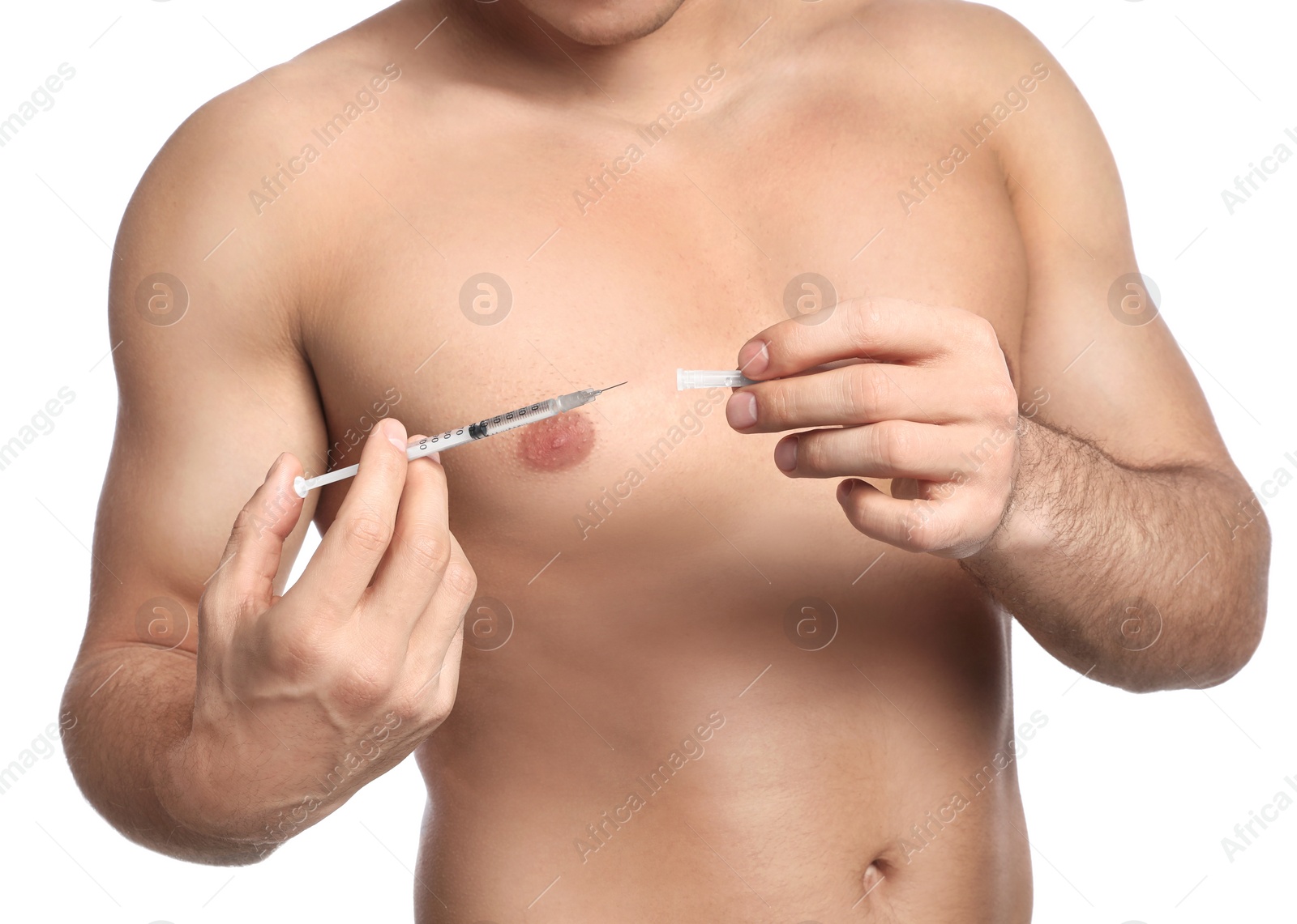 Photo of Athletic man with syringe on white background, closeup. Doping concept