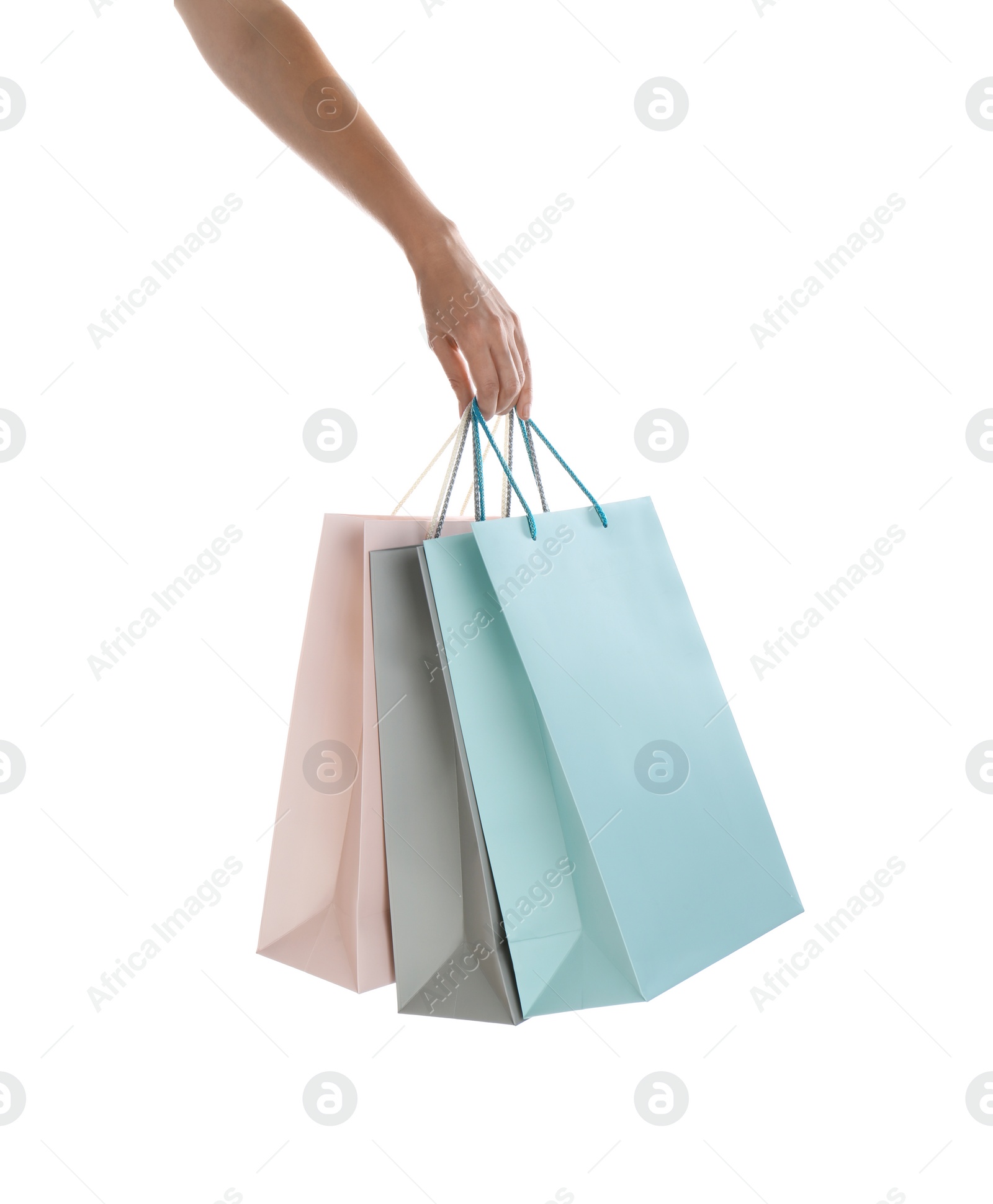 Photo of Woman with paper shopping bags on white background, closeup