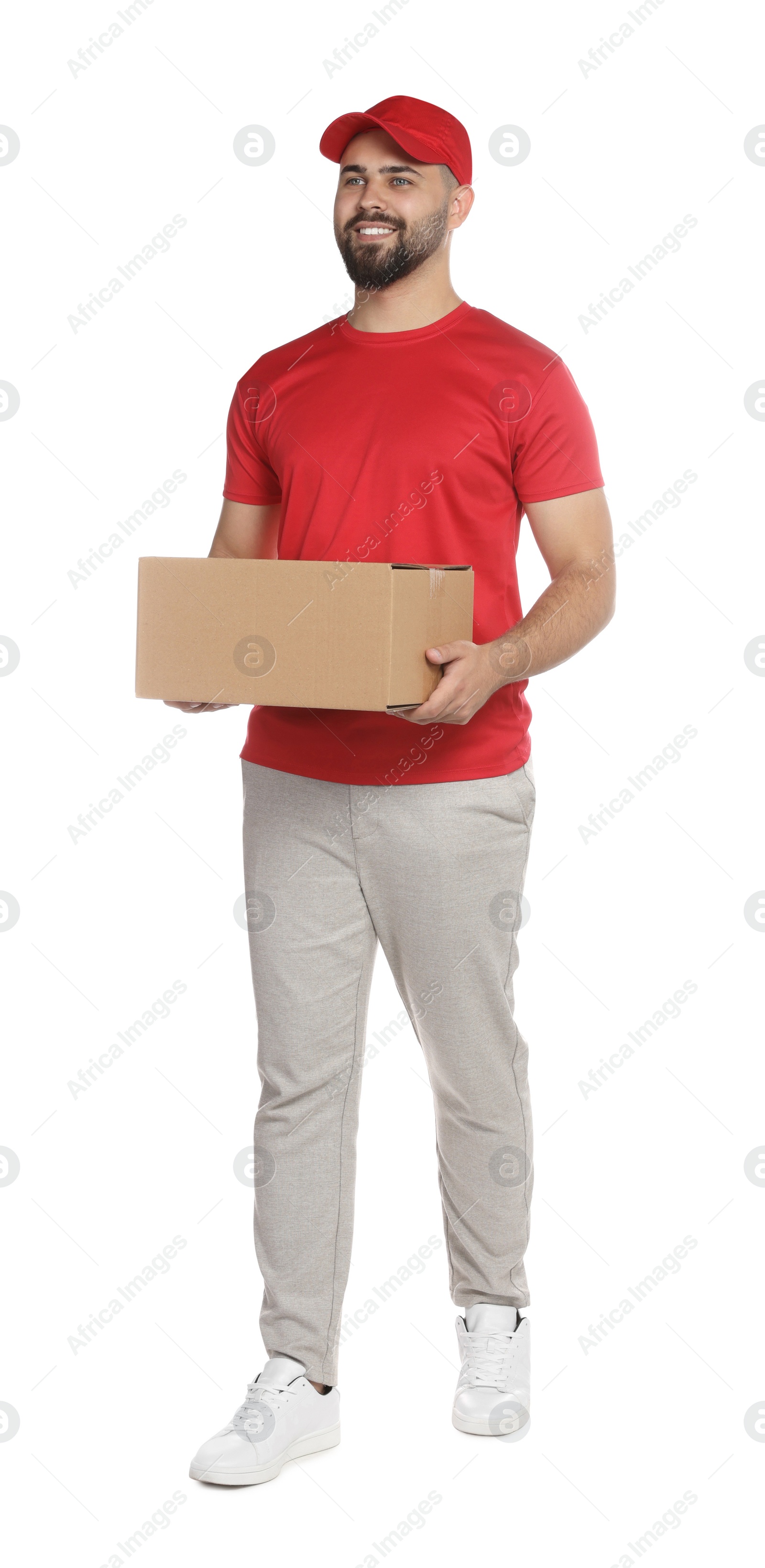 Photo of Courier holding cardboard box on white background