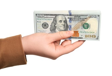 Money exchange. Woman holding dollar banknotes on white background, closeup